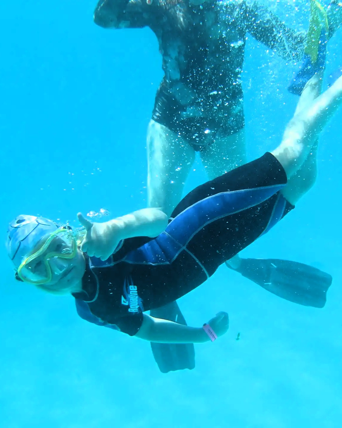 Crystal clear waters around Bawe Island snorkeling spot