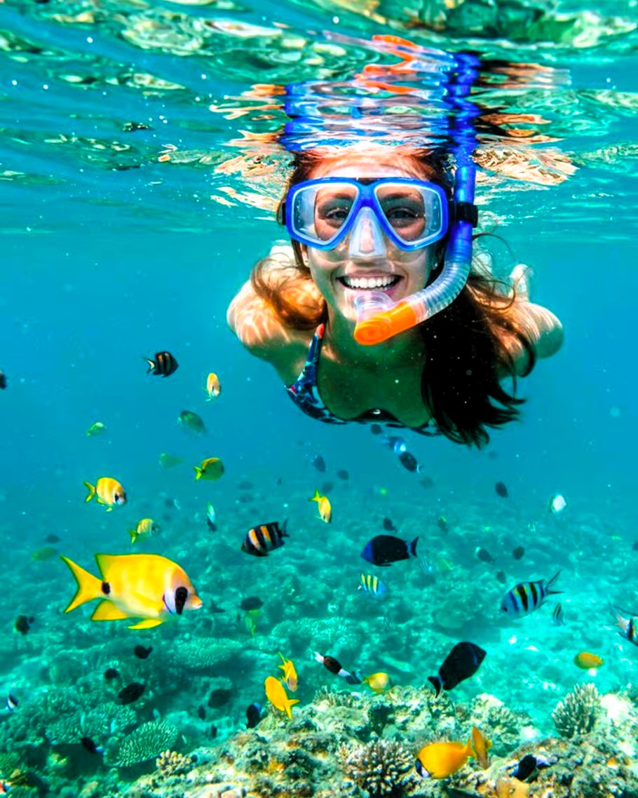 Blue Lagoon snorkeling adventure with tropical fish and coral reefs