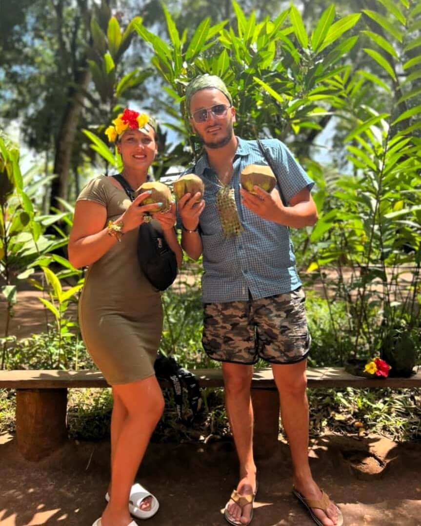 Local guide showing spices on the Zanzibar farm tour