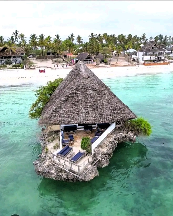 Guests enjoying lunch at The Rock restaurant in Zanzibar
